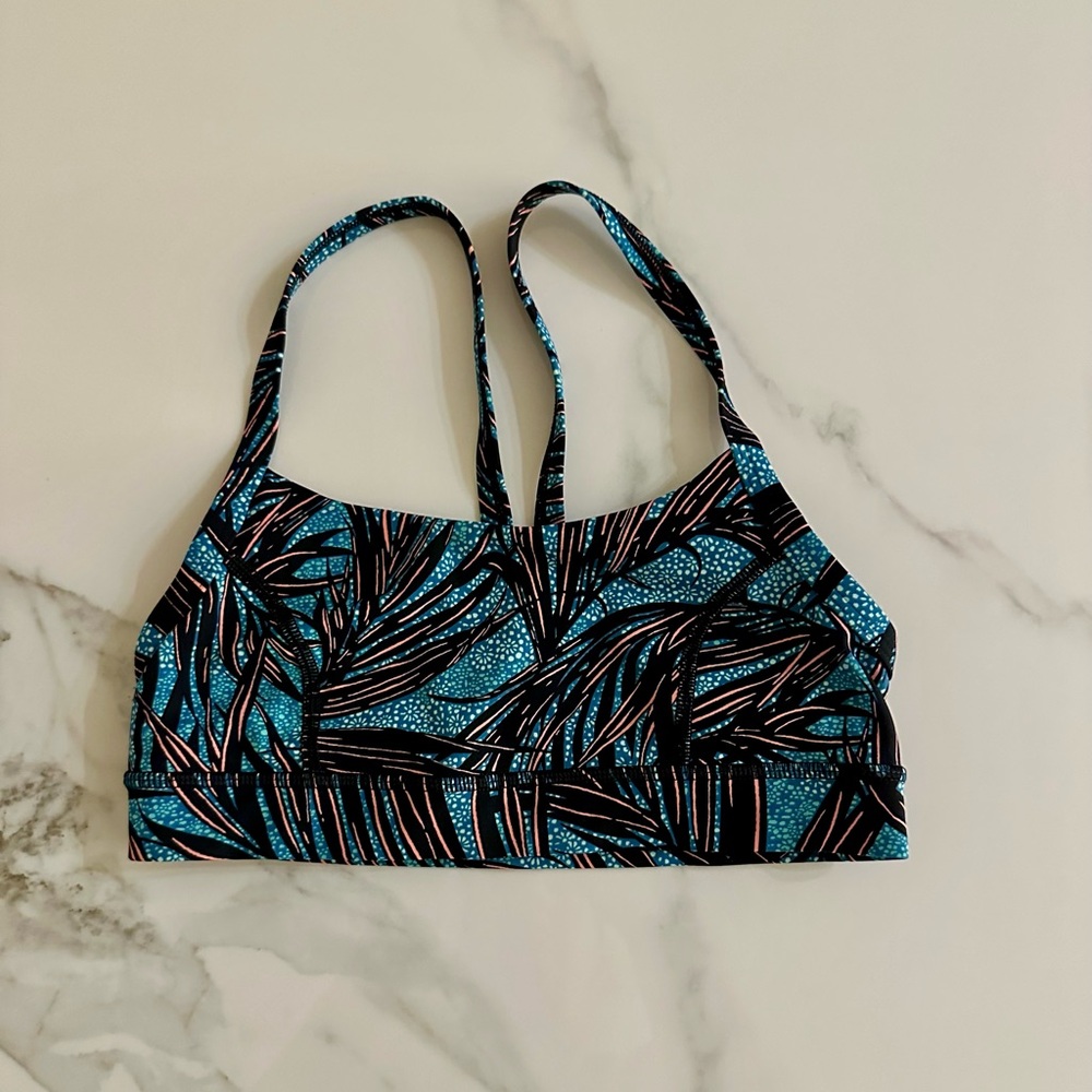Lululemon Rise and Run Bra in the Mini Palm Lace Tofino Teal Multi